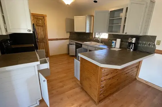 Painted cabinetry and interior finish details in a Colorado Springs home
