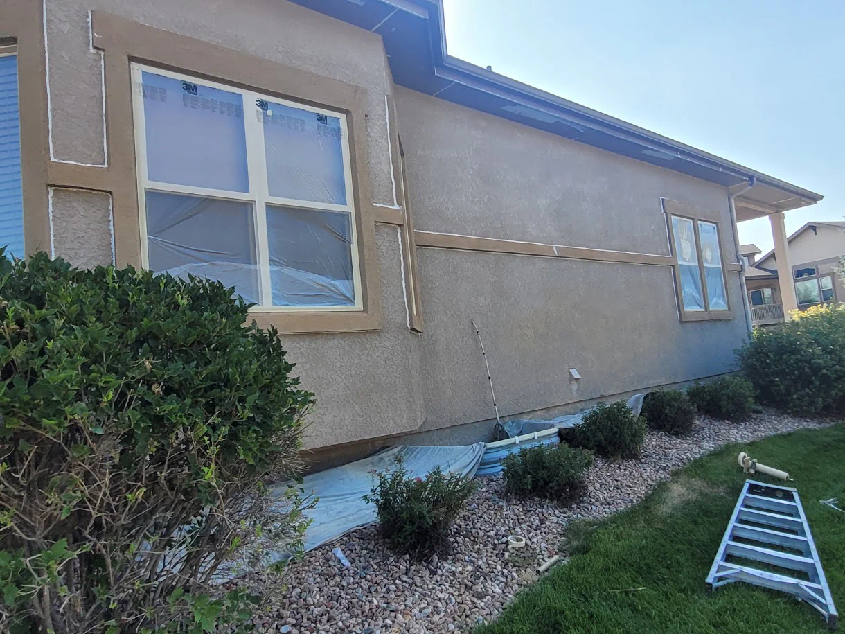 Stucco preparation and repair before exterior painting